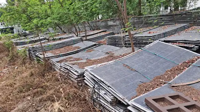 Reference photo of solar panels stacked outdoors